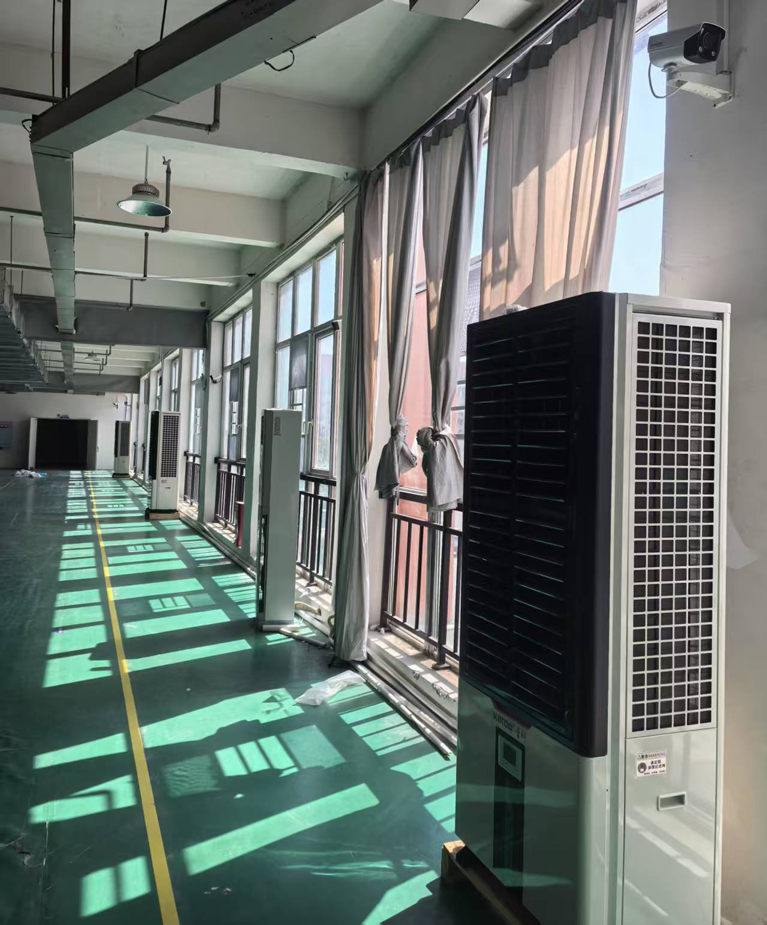 制衣廠整體制冷降溫，應用星科蒸發冷省電空調-立式軸流雙風口柜機